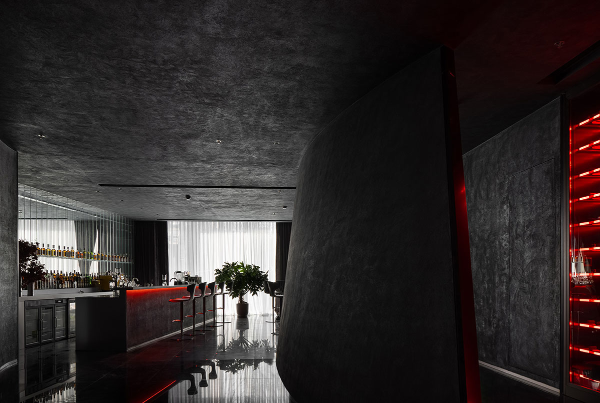 AD ARCHITECTURE designs restaurant in Beijing with black interiors creating a sense of mystery
