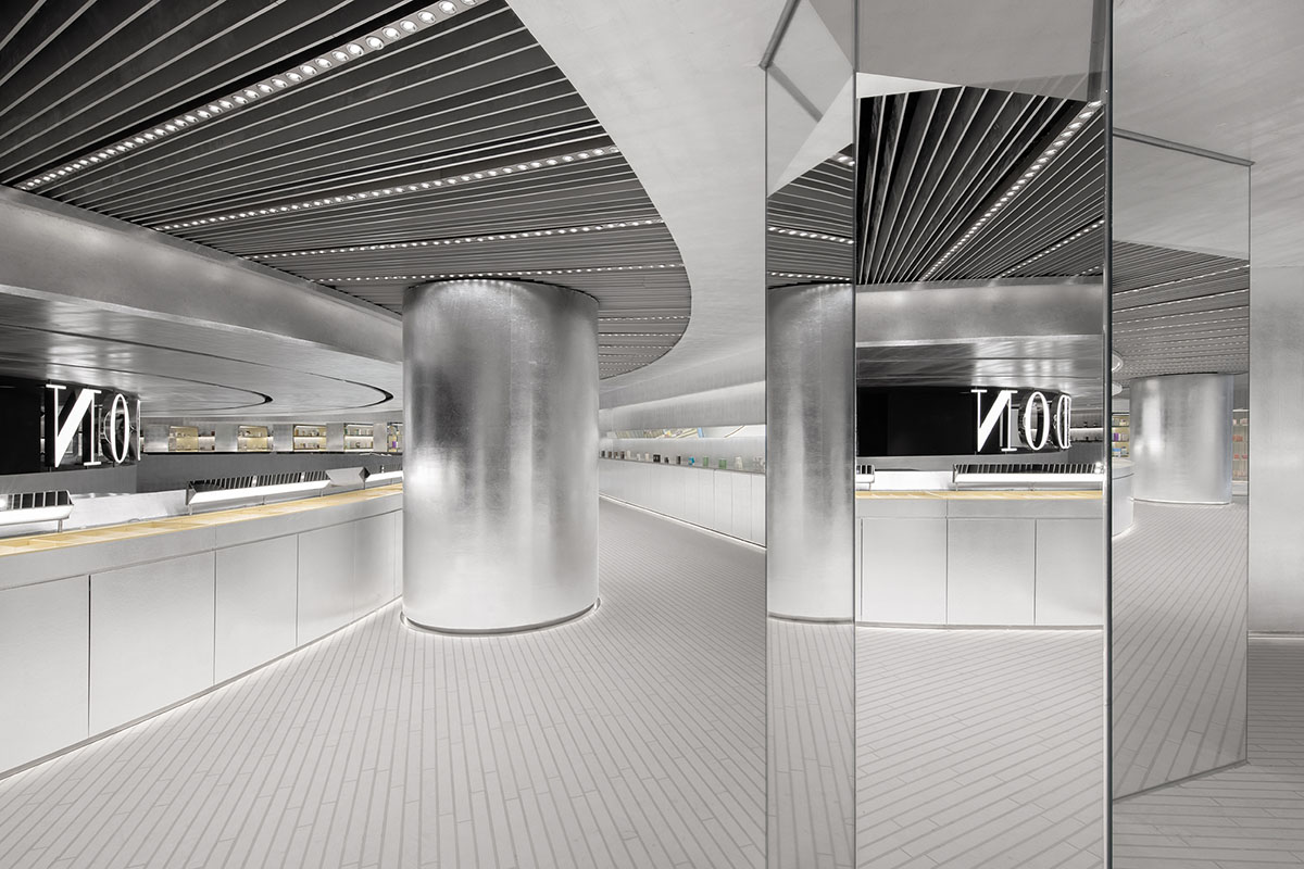 Various Associates designs beauty store with winding staircase and silver-toned interiors in Hangzhou