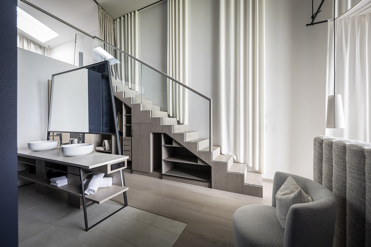 noa* designs boutique hotel and wellness featuring trapezoidal façade in an old farm of Soprabolzano