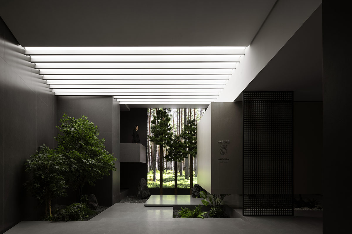 Exhibition hall interiors feature sharp angles and surfaces addressing diamond cutting processes