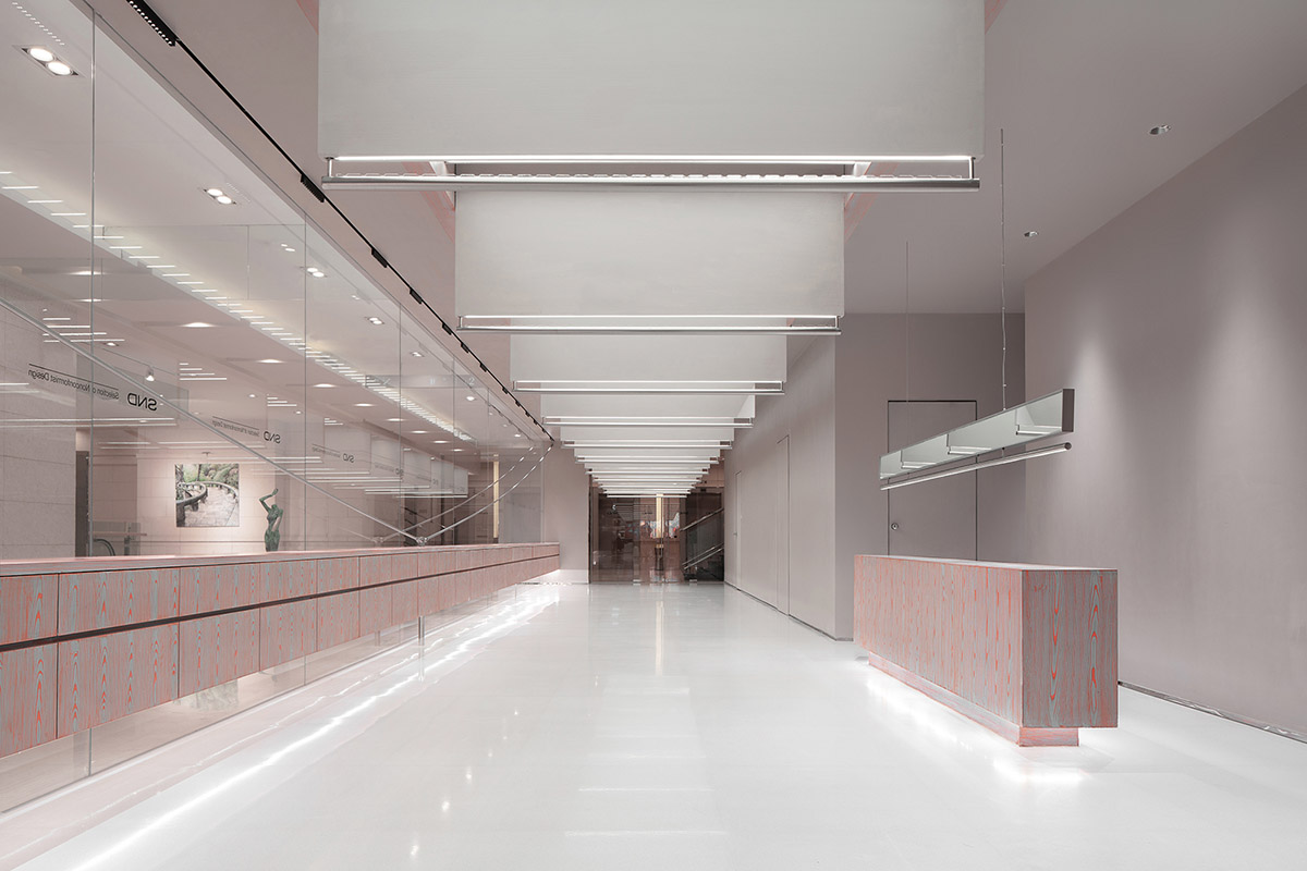 Various Associates creates show-like and pink-hued fashion store under a viaduct in Chongqing