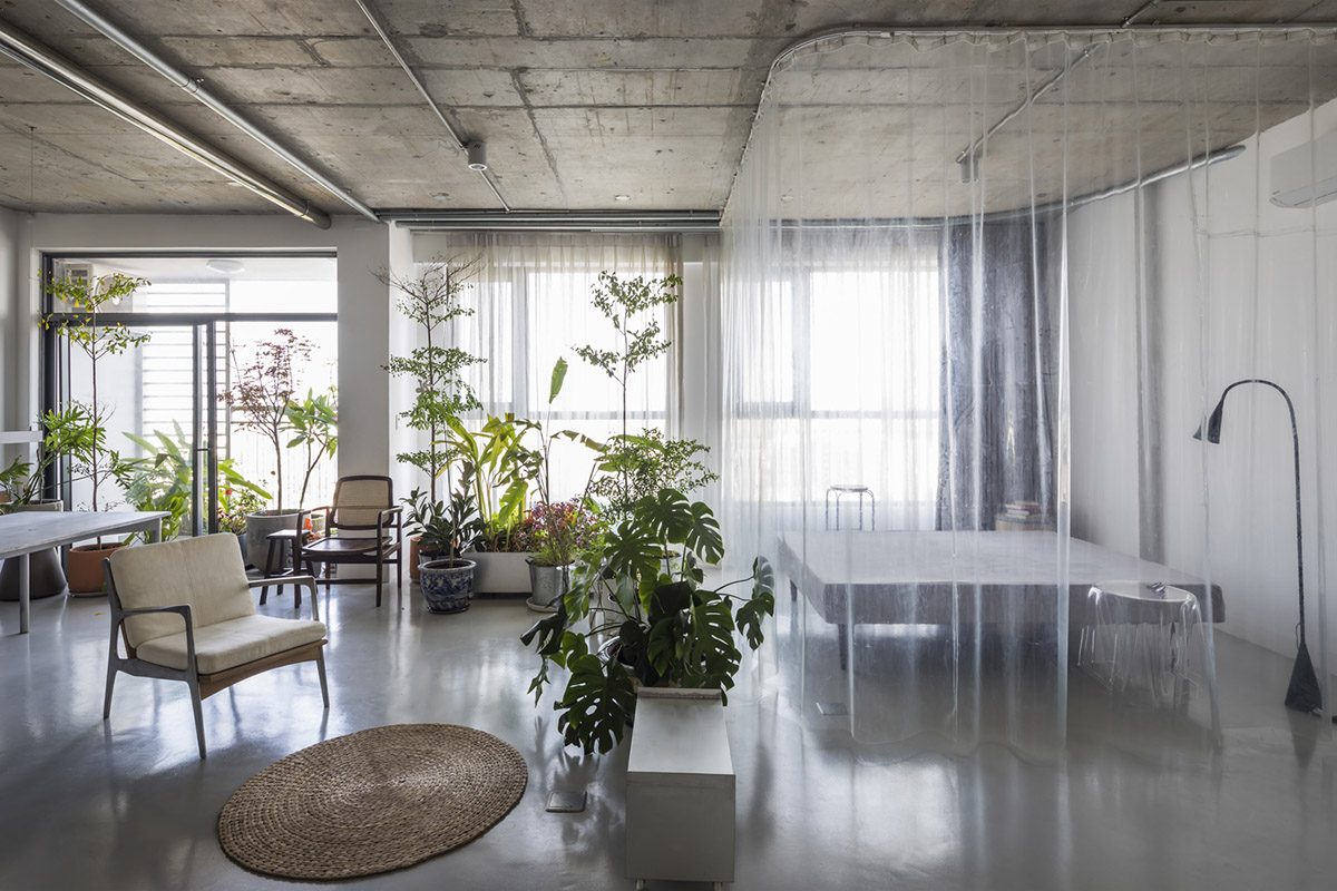Nhabe Scholae creates landscape-like interior with translucent curtains inside an apartment