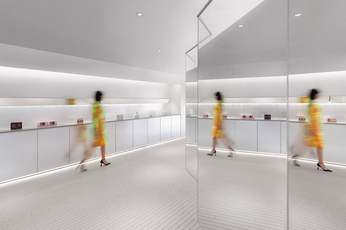 Various Associates designs beauty store with winding staircase and silver-toned interiors in Hangzhou
