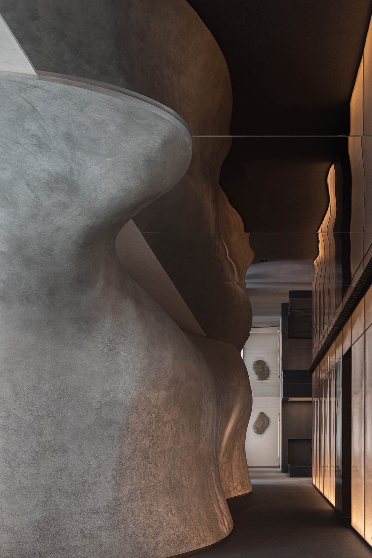 Nature Times Art Design completes restaurant with cave-like wall and garden-themed hall in Hangzhou