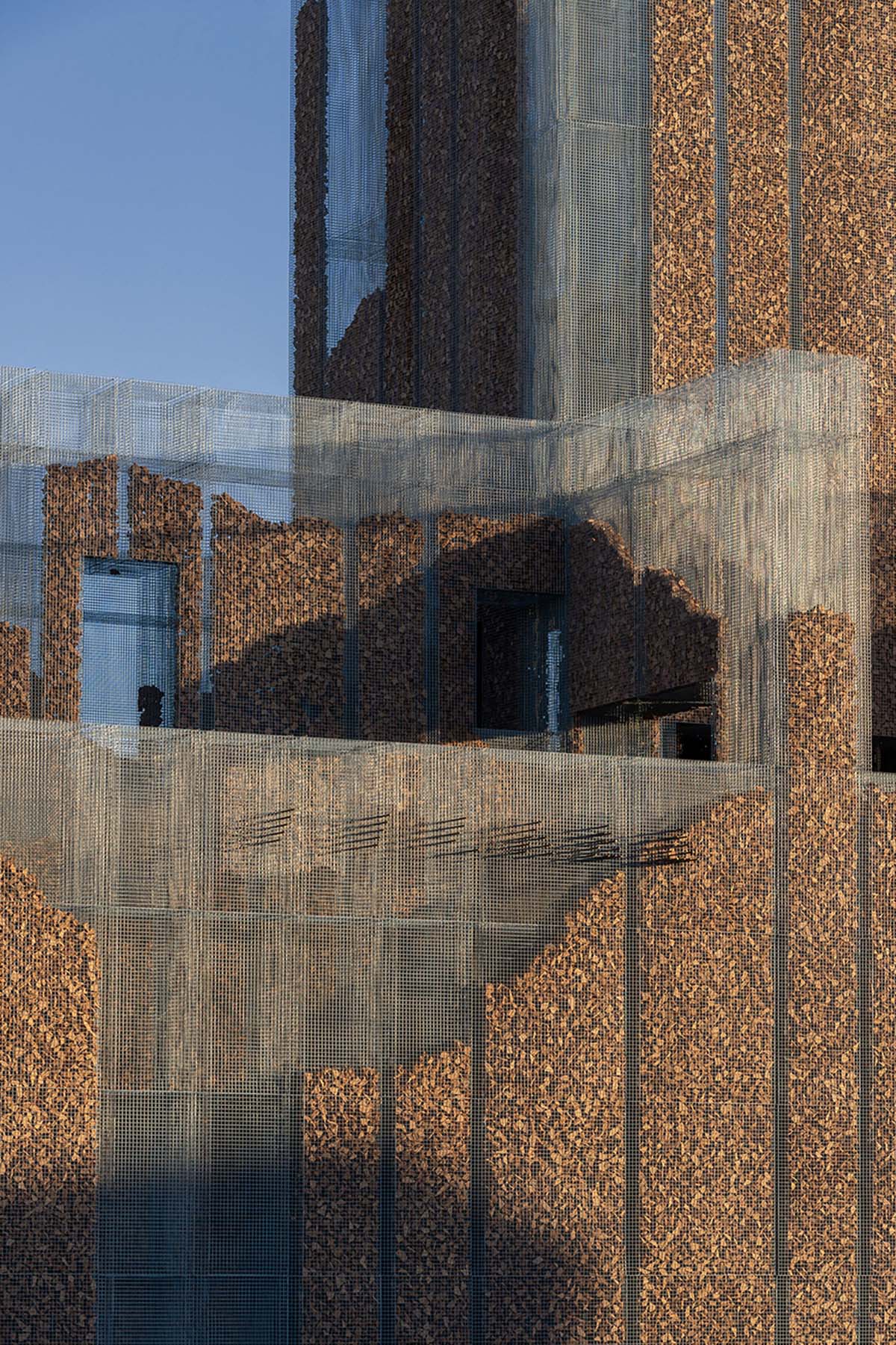 Studio Studio Studio combines wire mesh with cork for this experiential pavilion in Riyadh