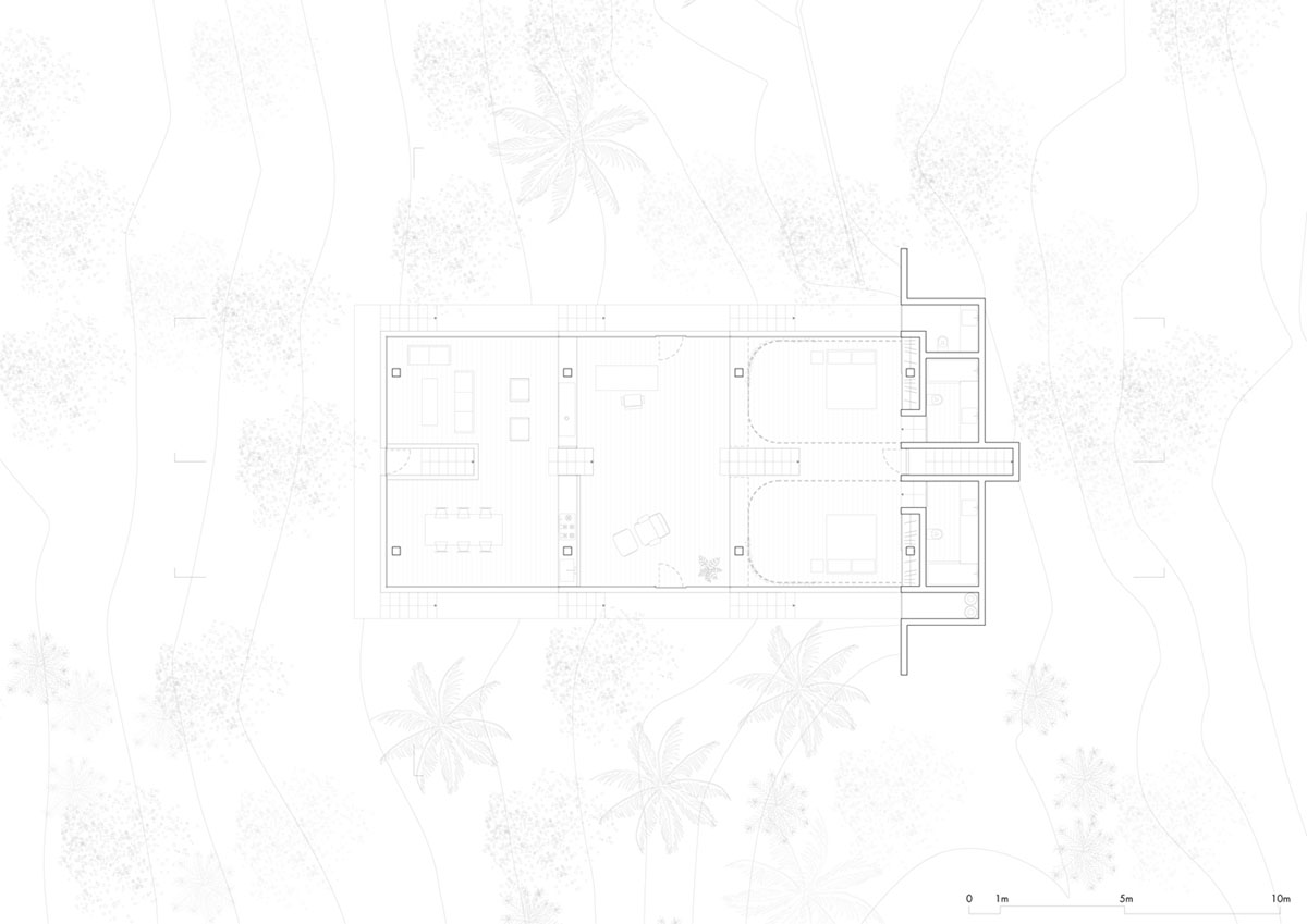 Two bold concrete platforms define this transparent library house by Atelier Branco Arquitetura