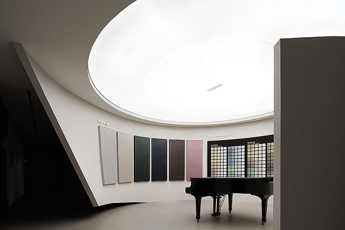 Exhibition hall interiors in China feature unconstrained flowing wall evoking