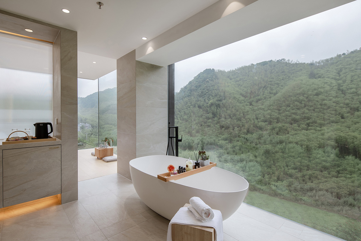 Cube Hotel, made of black skeleton, provides equal space to each room overlooking bamboo forests