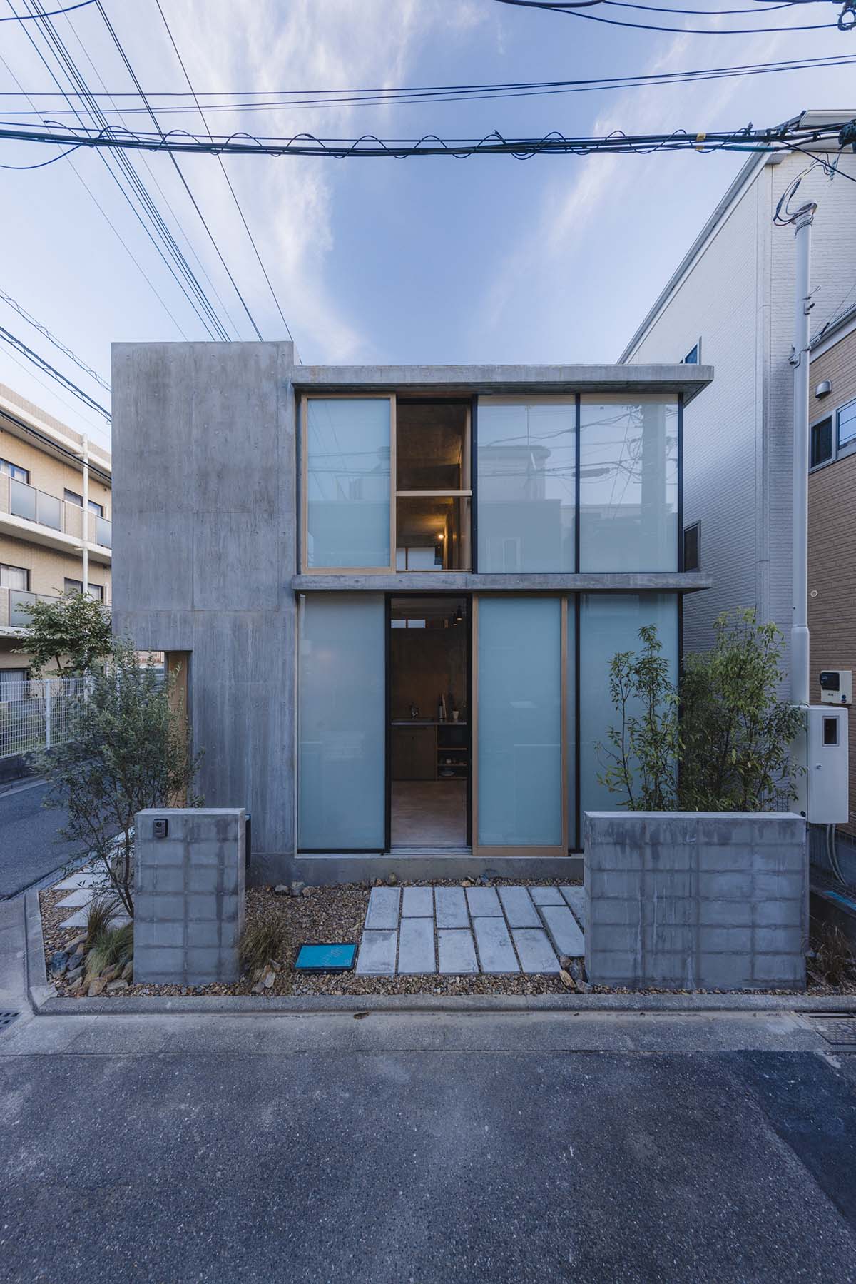 IGArchitects completes Check Patterned House on a corner site in Japan