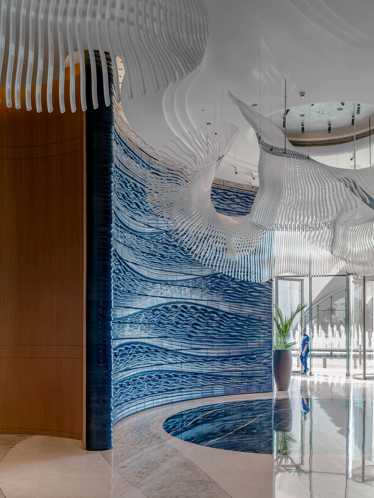 Studio RAP wraps the entrance of a hotel with majestic 3D printed ceramic walls 