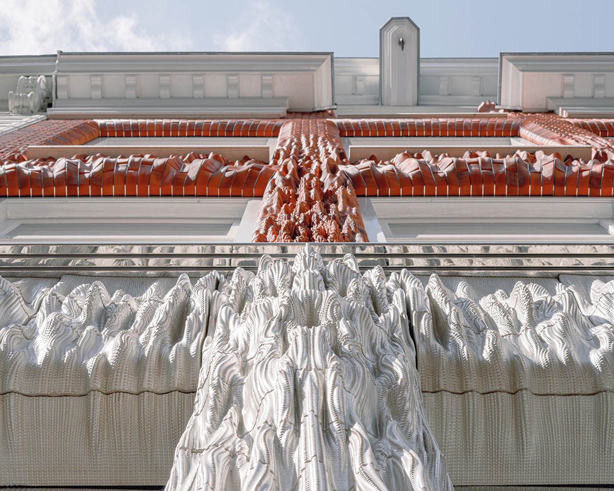 Studio RAP creates façade featuring bespoke 3D-printed ceramic tiles and bricks