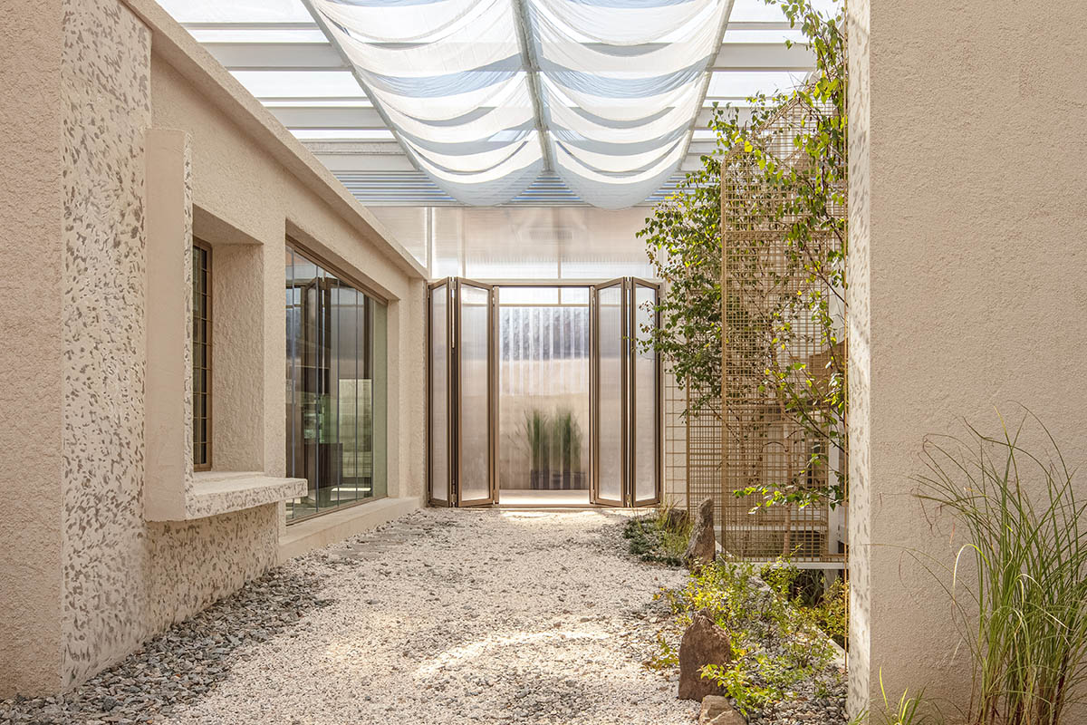 one-aftr converts old factory buildings into a fragmented cafe in South Korea