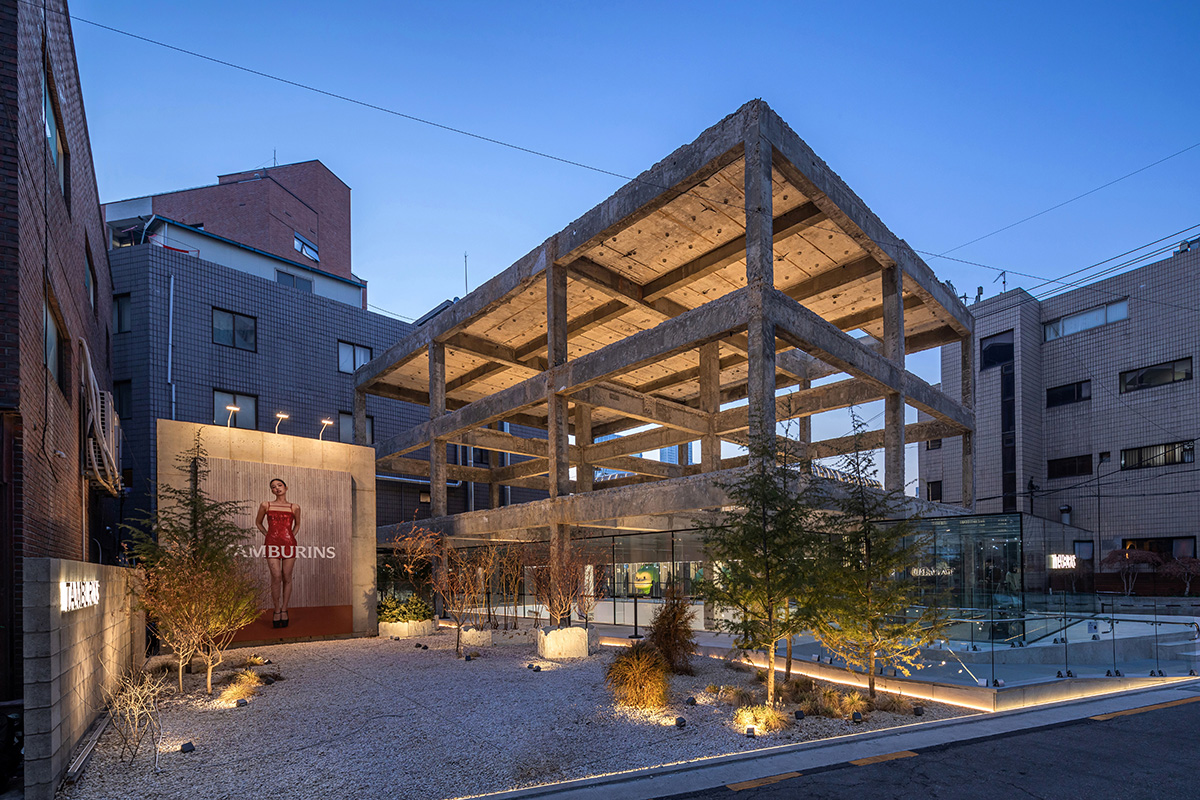 Perfume store by The System Lab shows the beauty of scent with gridded concrete and glass box