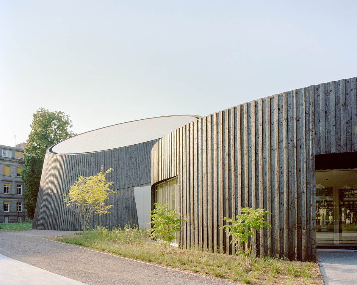 Planetarium clad in burnt wood at Université de Strasbourg evokes 19th century machine buildings
