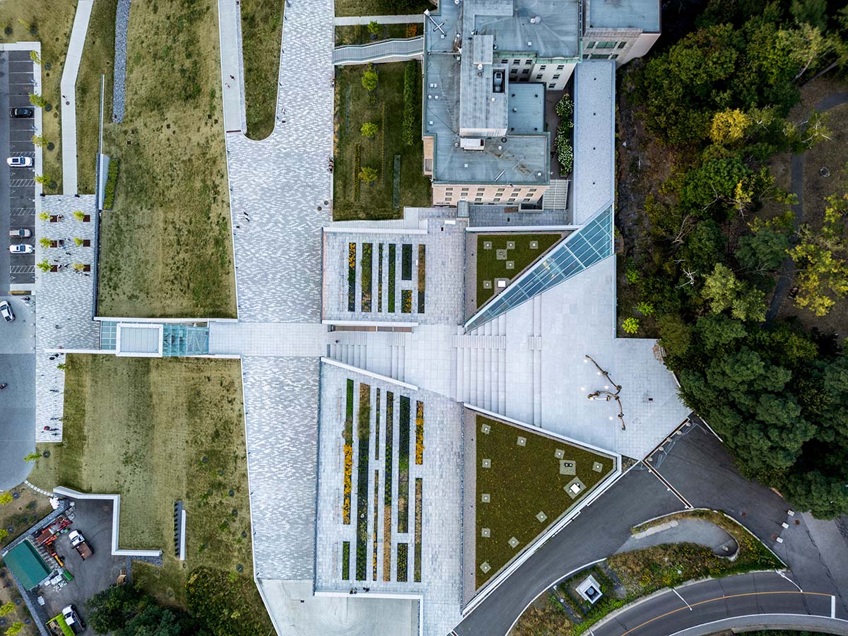 A striking bell tower pierces the sky, illuminating the grandeur of the pavilion in Montreal