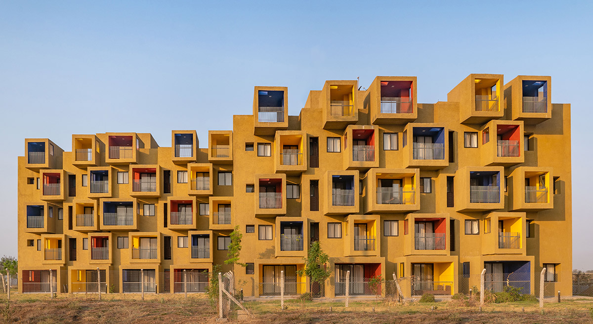 Sanjay Puri Architects designs residential building with colorful cuboid terraces in India
