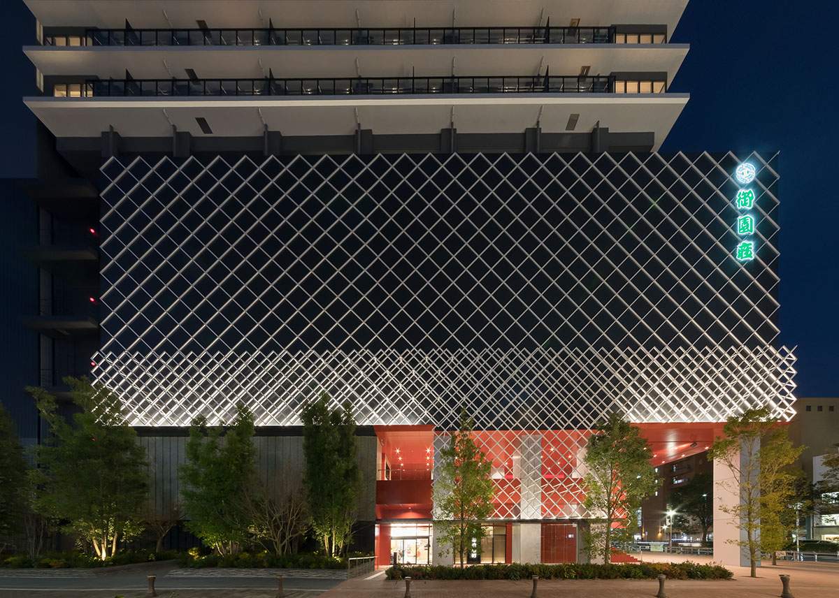 Kengo Kuma revives Japan's historic theatre with black square tiles creating motif on the façade