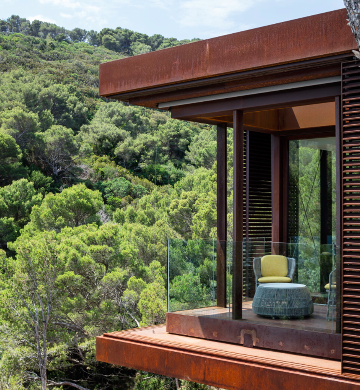 This Is Arquitectura completes corten steel Guest Pavilion in the middle of forest in Spain