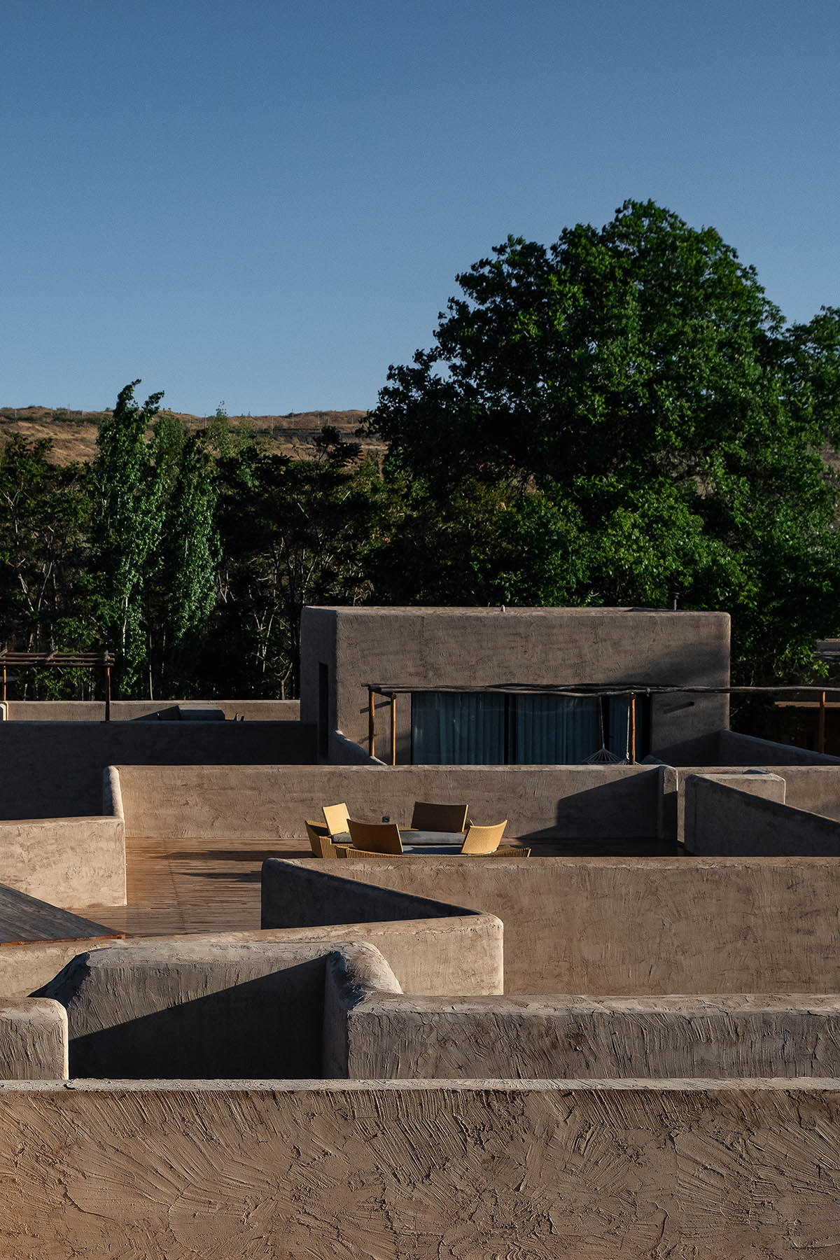 DAS Lab completes Lost Villa Boutique Hotel with earth-toned colours and smooth details in Ningxia