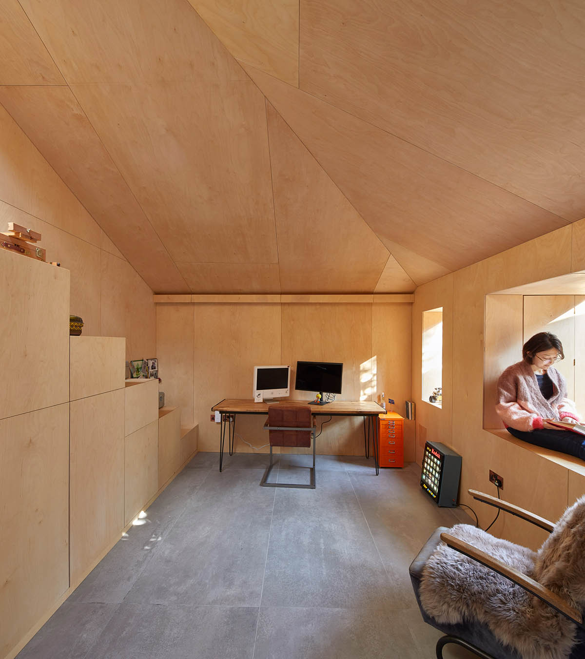 RISE Design Studio built sunken garden studio with rusted steel to provide a hidden place to escape