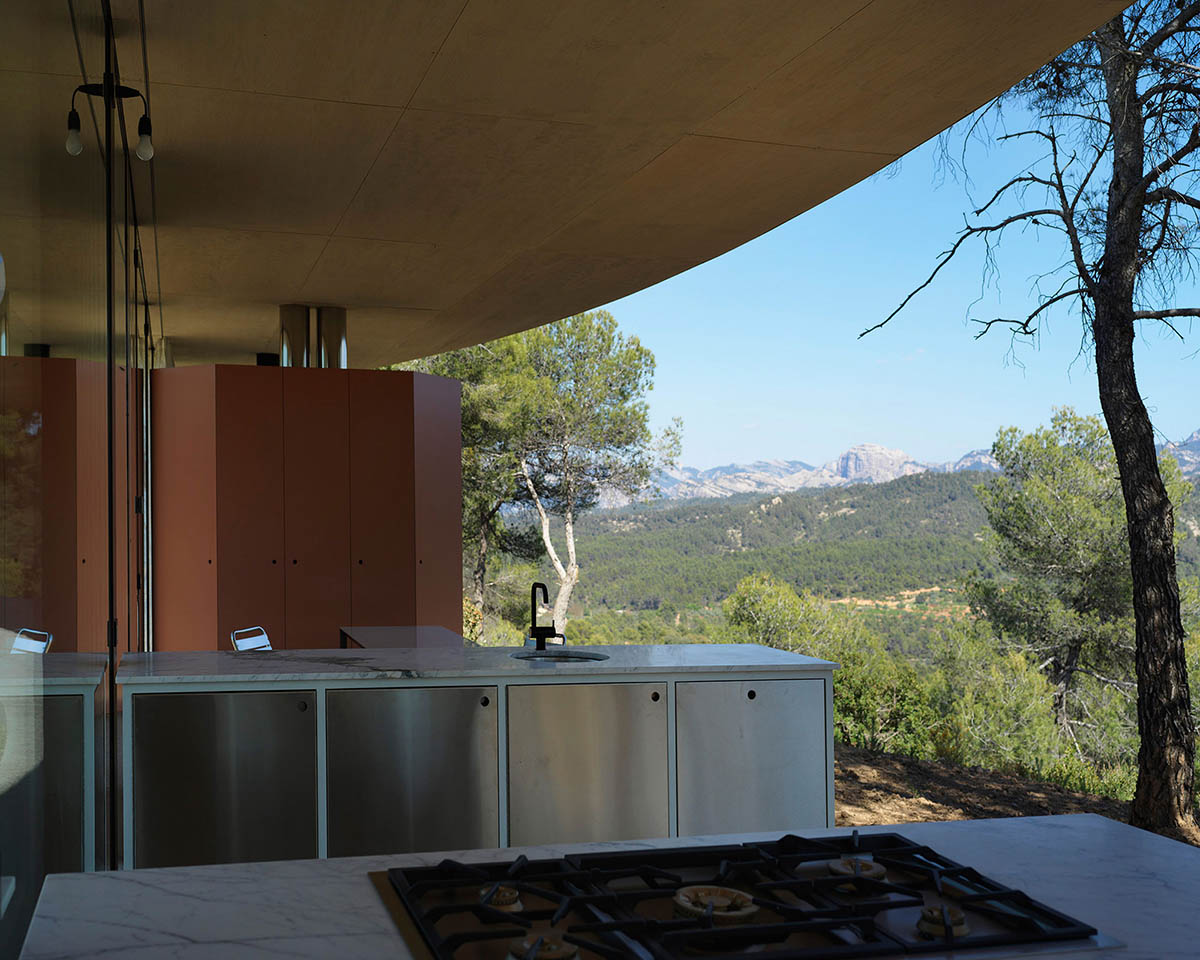 Office KGDVS’ Solo House presents a circular catwalk overlooking wilderness of Matarraña