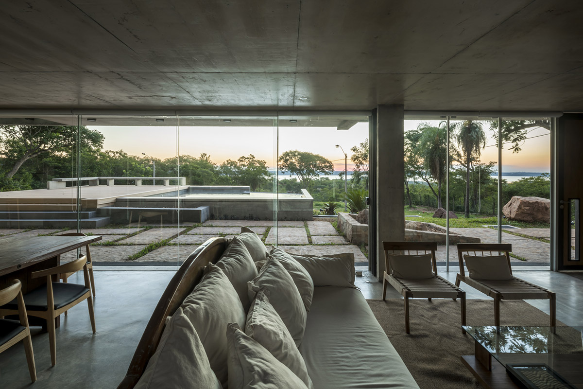 OMCM arquitectos brings rocky landscape inside of this weekend house in Paraguay