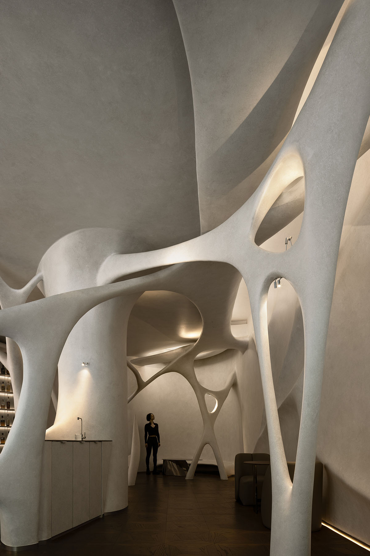 Neuron-like interior by AD ARCHITECTURE combines purity and complexity for cafe and bar in Shenzhen