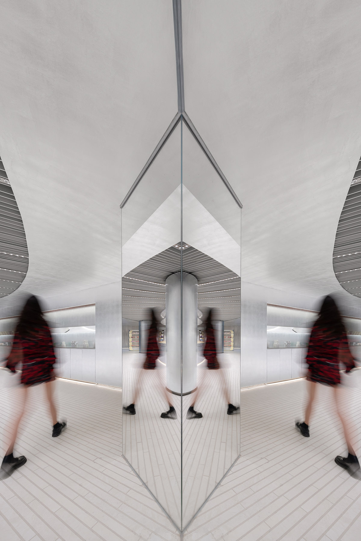 Various Associates designs beauty store with winding staircase and silver-toned interiors in Hangzhou