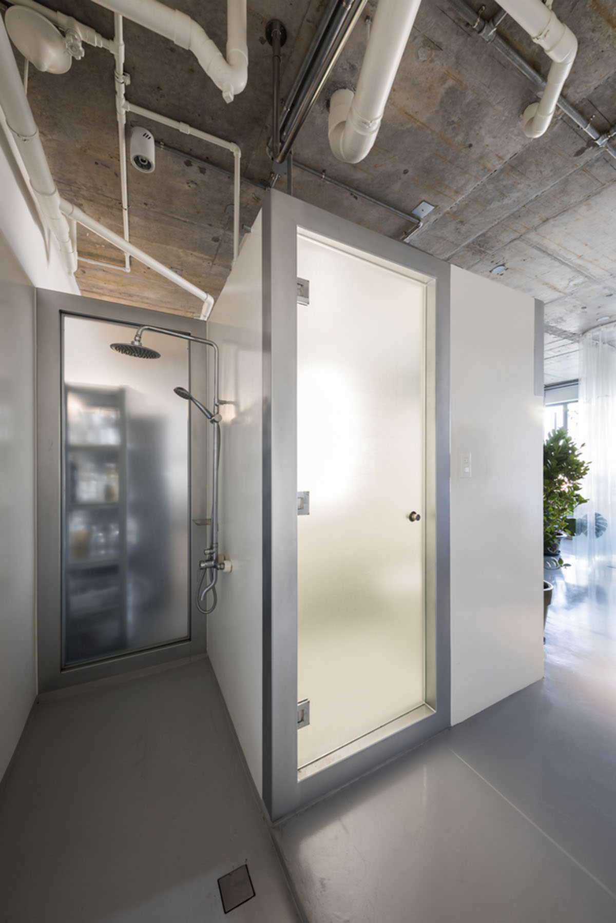 Nhabe Scholae creates landscape-like interior with translucent curtains inside an apartment