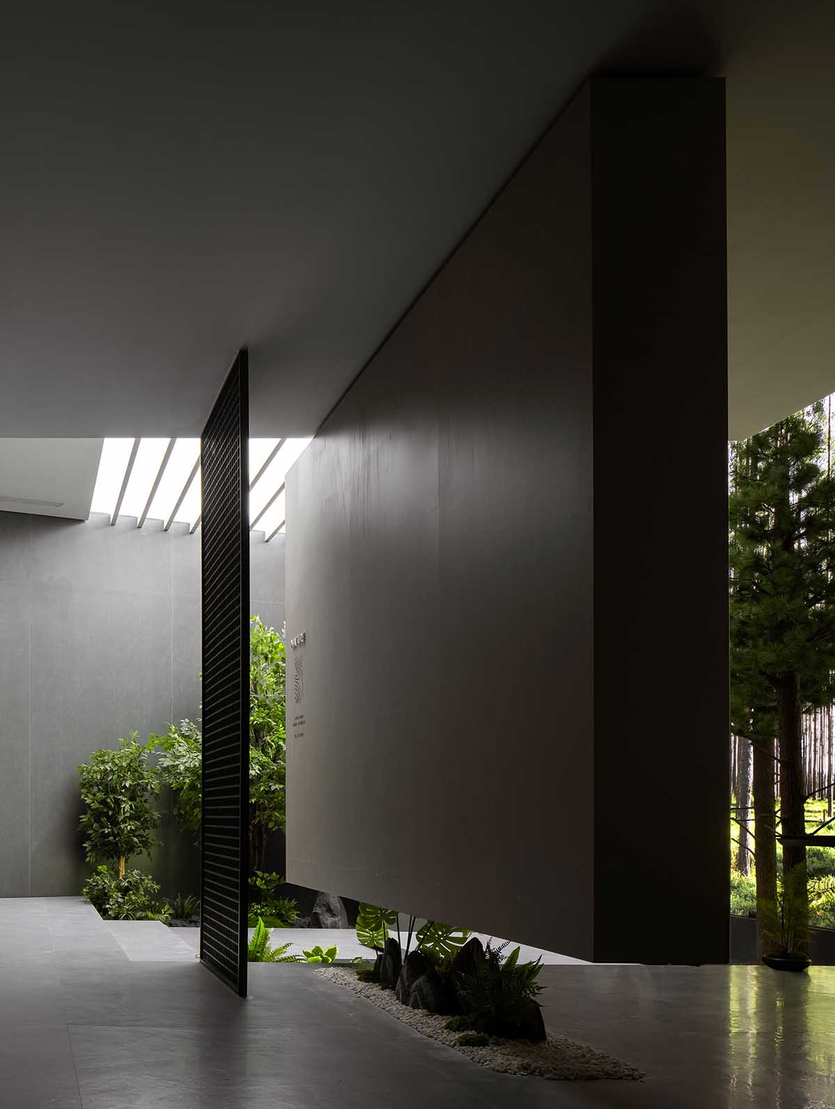 Exhibition hall interiors feature sharp angles and surfaces addressing diamond cutting processes