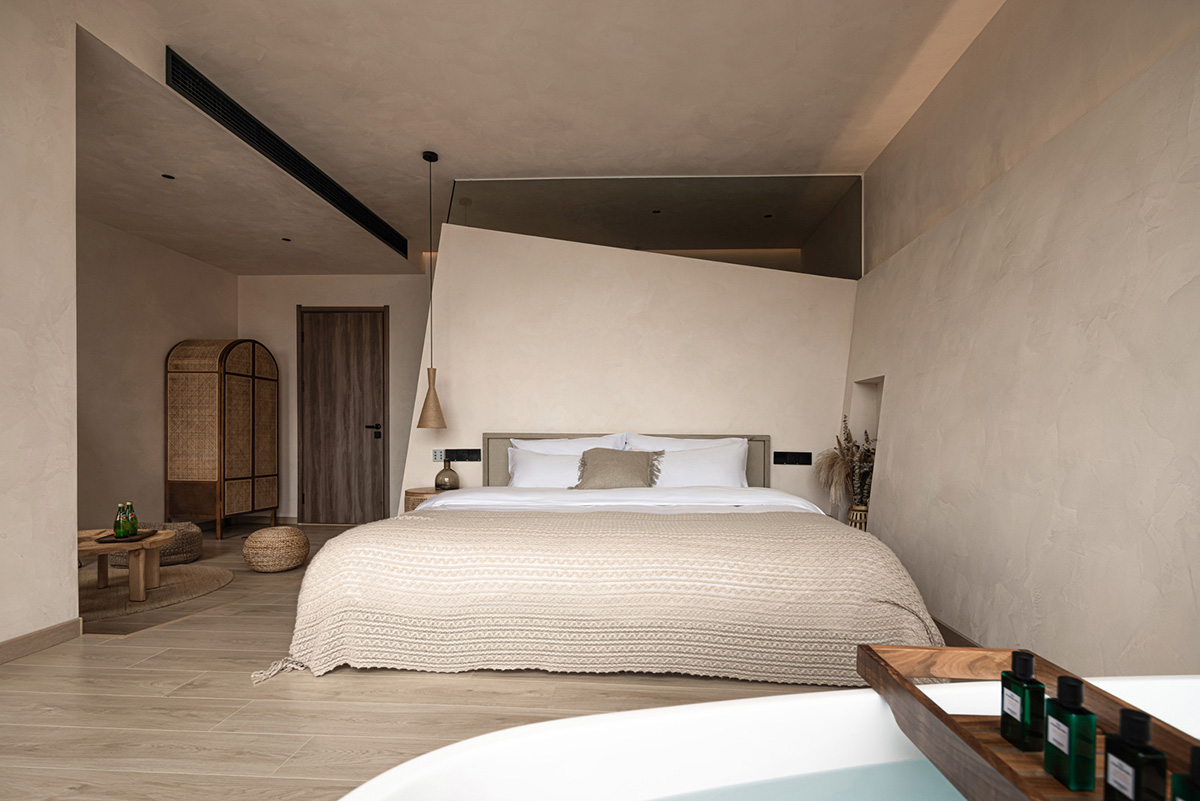 Oblique and hollow walls form this sculpted hotel by AT DESIGN in Southeast of Xiamen