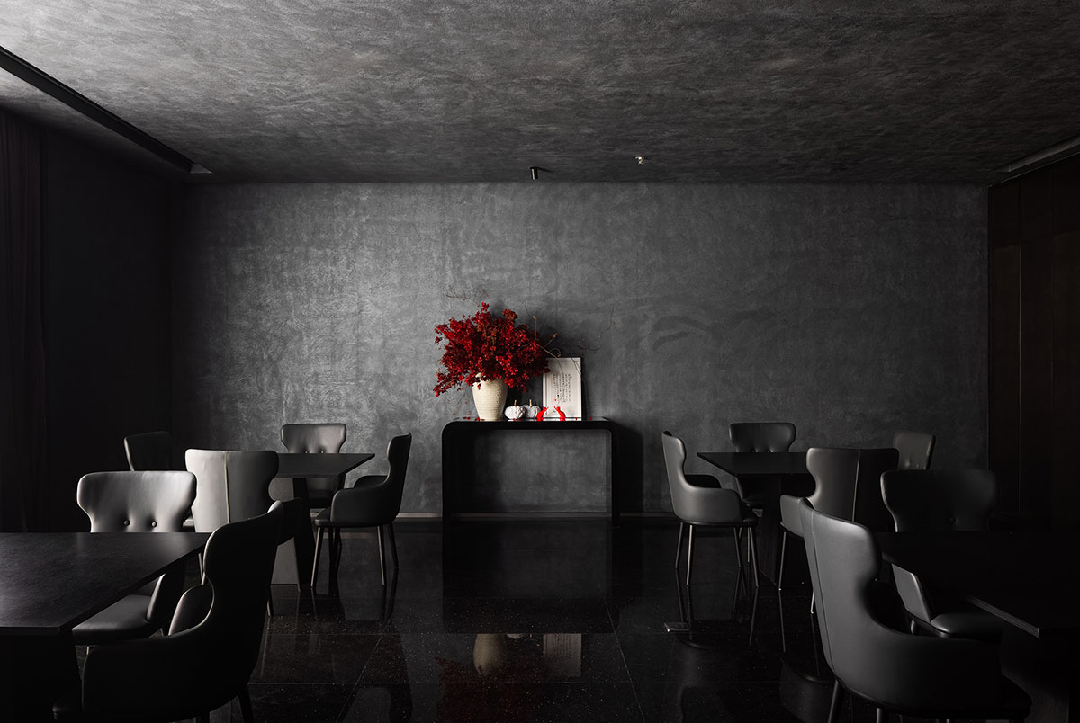AD ARCHITECTURE designs restaurant in Beijing with black interiors creating a sense of mystery