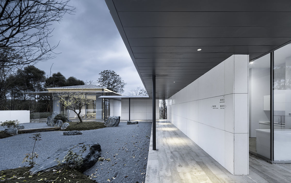 Hangzhou 9M Architectural Design embedded experience center with Large pieces of glasses in the hill