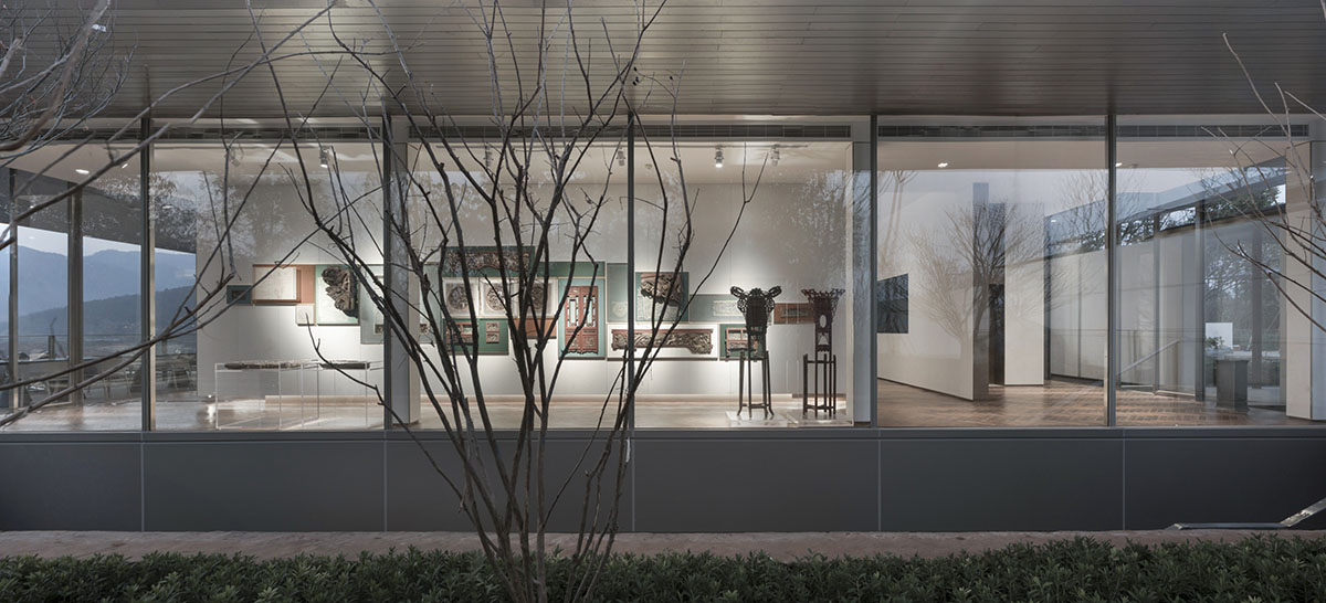 Hangzhou 9M Architectural Design embedded experience center with Large pieces of glasses in the hill