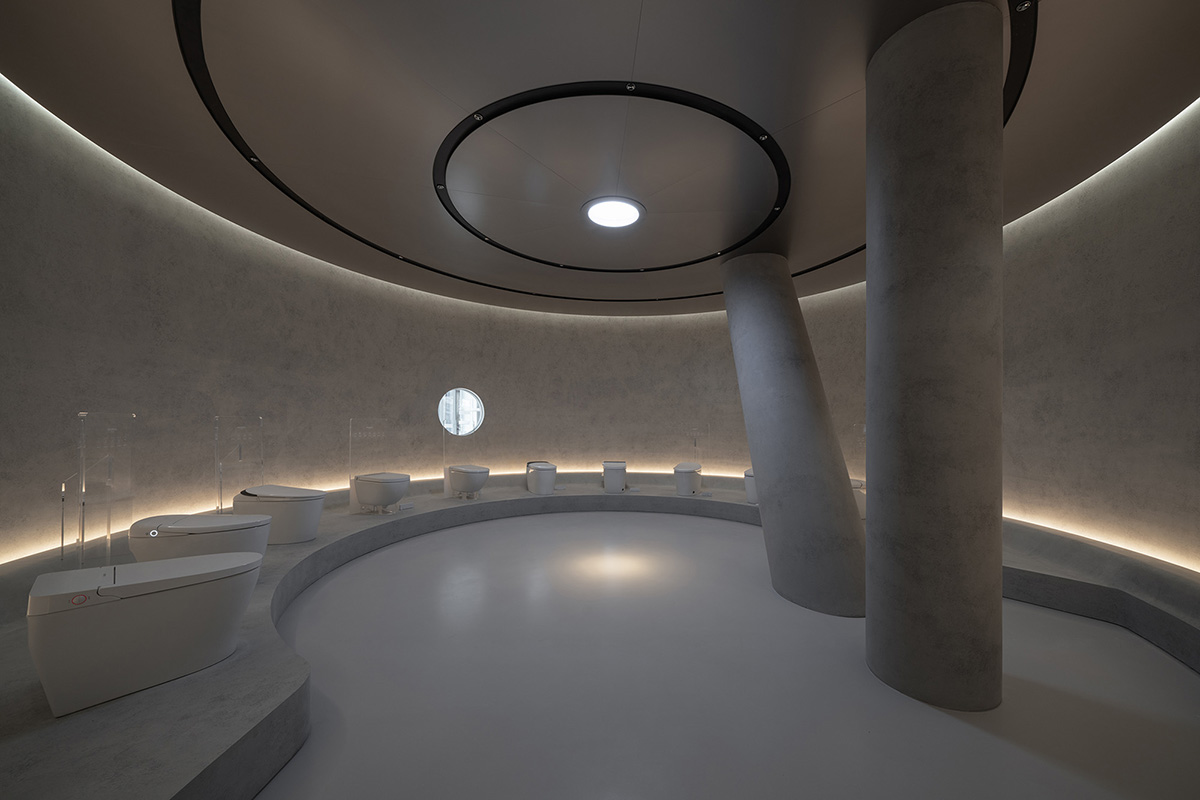 E Studio takes visitors into space travel with a flow of sculpted stainless steel for a showroom