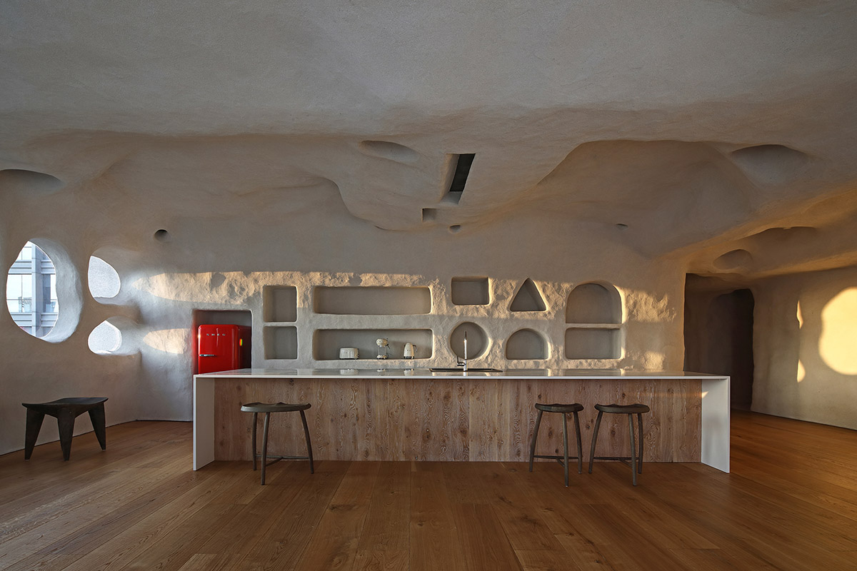 Pilates studio by Wanmu Shazi creates cave-like experience with amorphous interiors in Xiamen