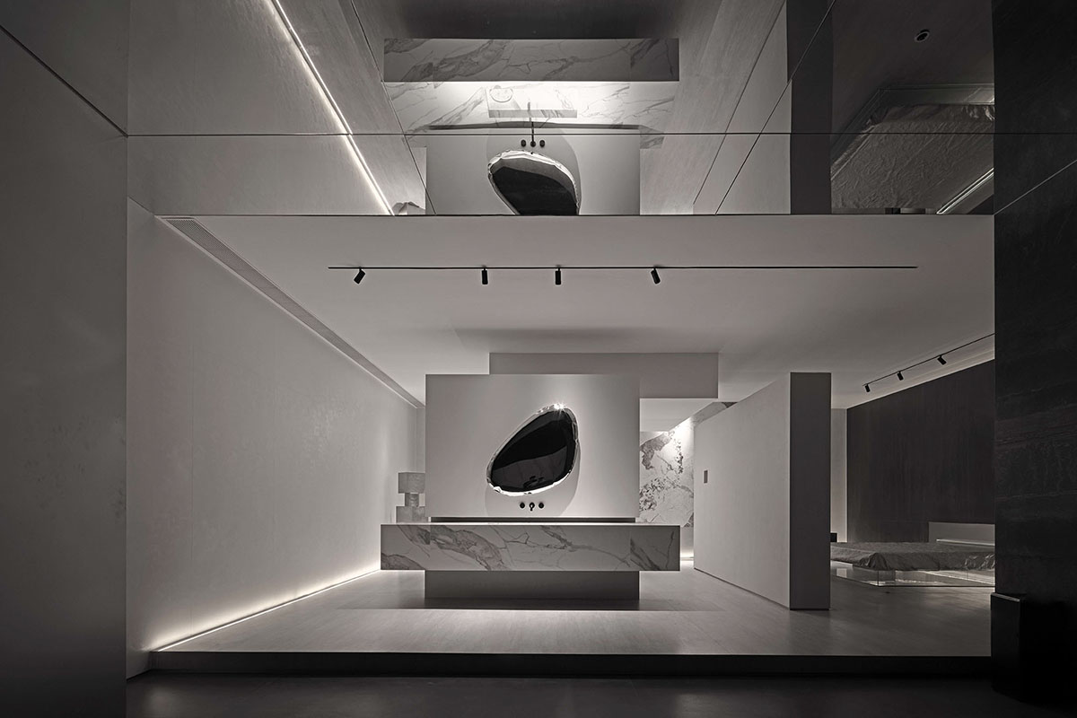 AD ARCHITECTURE creates dark interiors for showroom playing with light and sharp geometries in Foshan