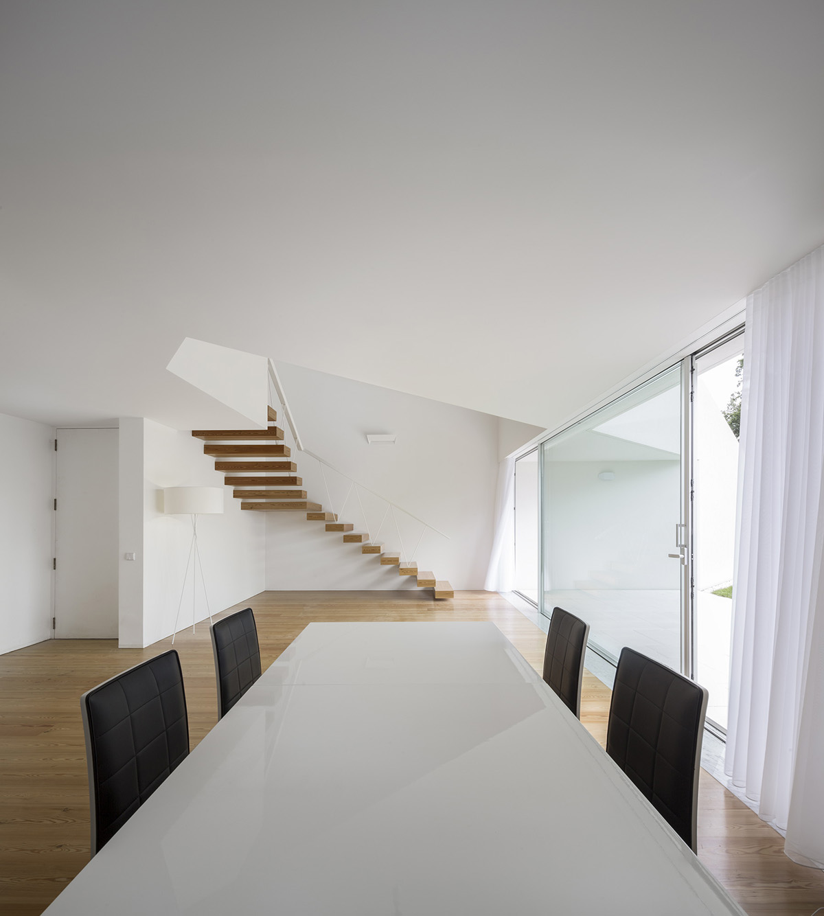 Rui Vieira Oliveira Built Multifaceted House placed atop Ancient Grape Mill In Portugal's village