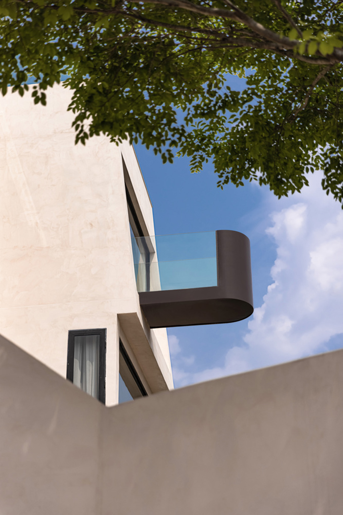 Oblique and hollow walls form this sculpted hotel by AT DESIGN in Southeast of Xiamen