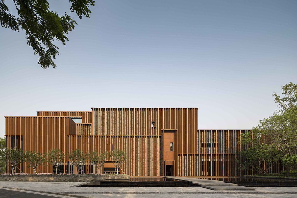 Neri&Hu clads cultural center with aluminum panels that soften heaviness of brick facade in Beijing