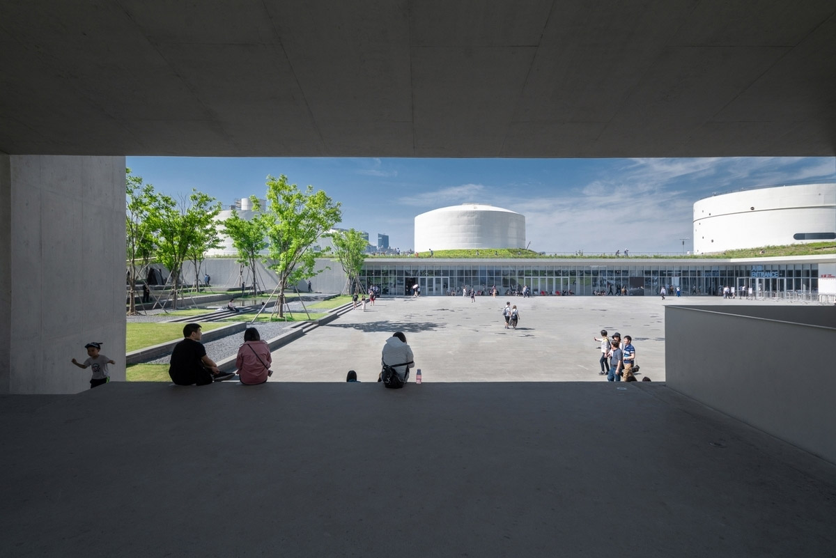 OPEN Architecture converts disused aviation fuel tanks into contemporary art center in Shanghai