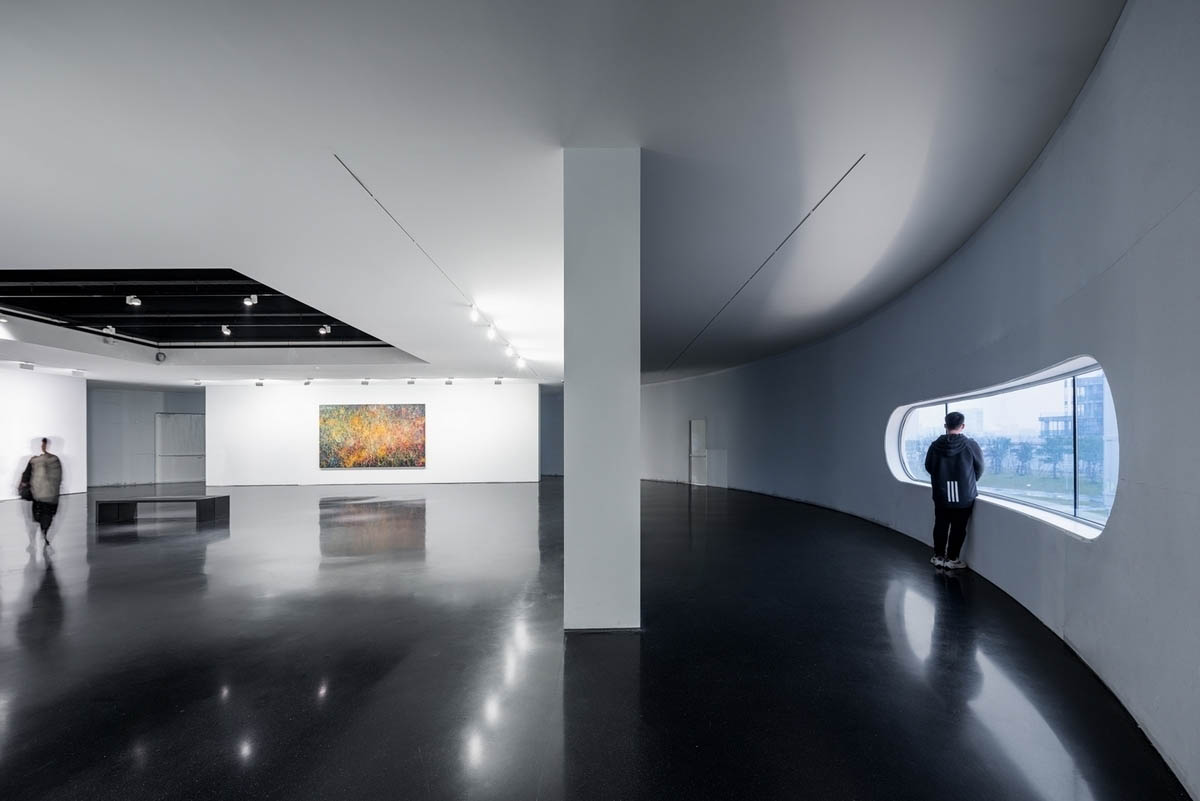 OPEN Architecture converts disused aviation fuel tanks into contemporary art center in Shanghai