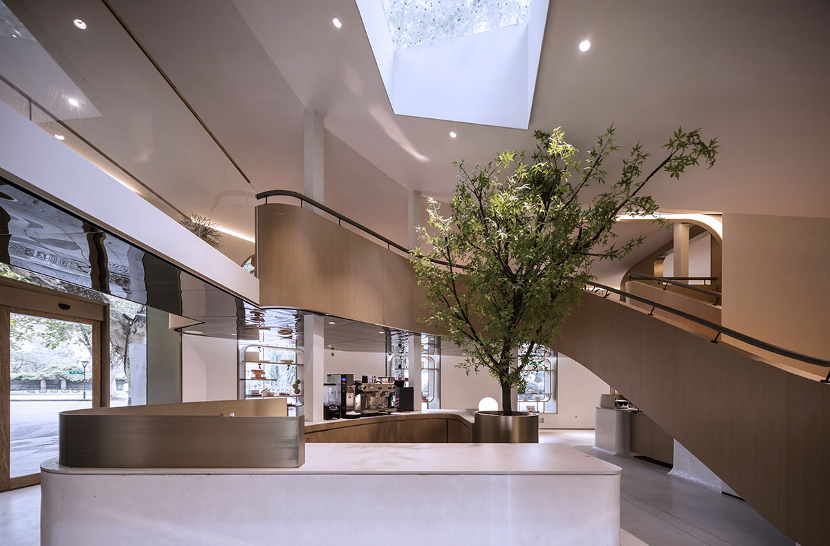 WJ Design combines dark facade with arched glass windows for pastry store in Hangzhou