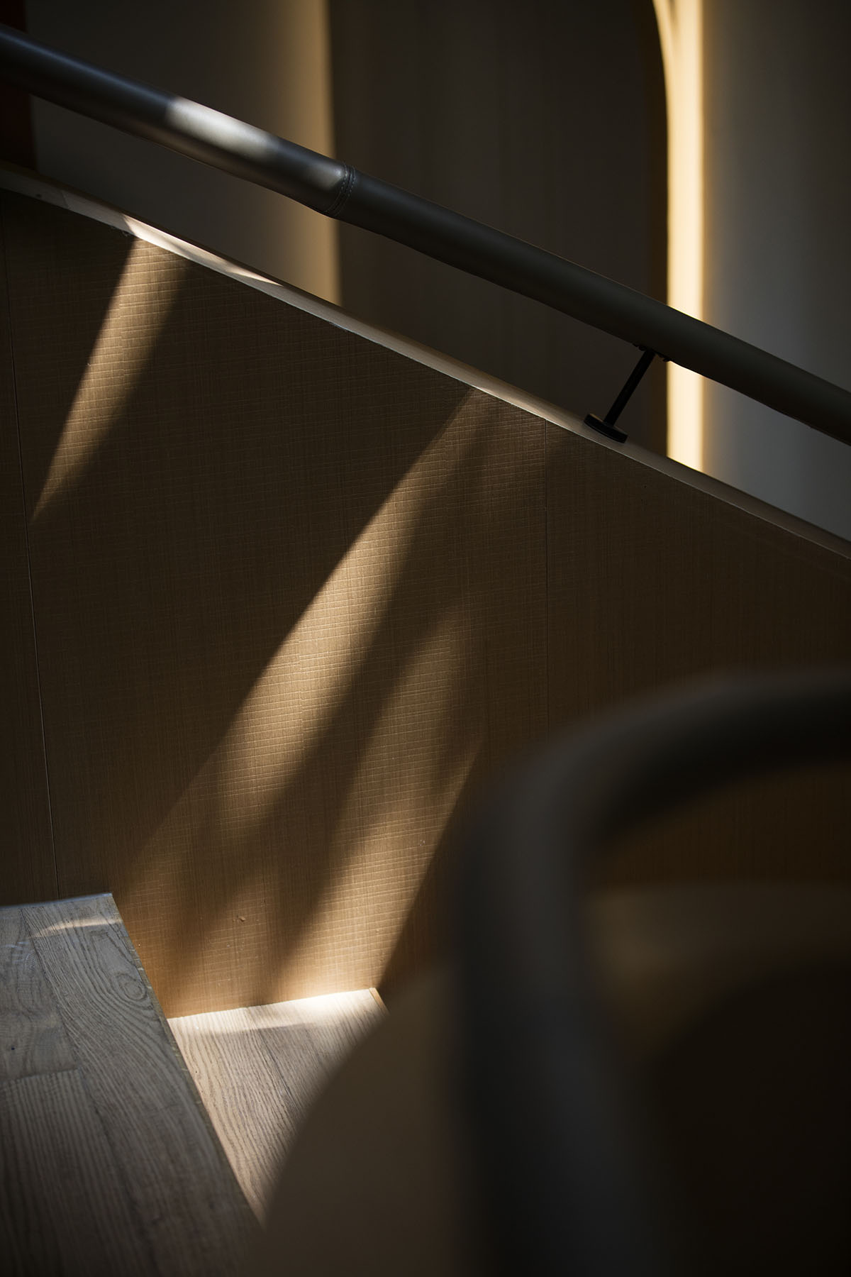 WJ Design combines dark facade with arched glass windows for pastry store in Hangzhou