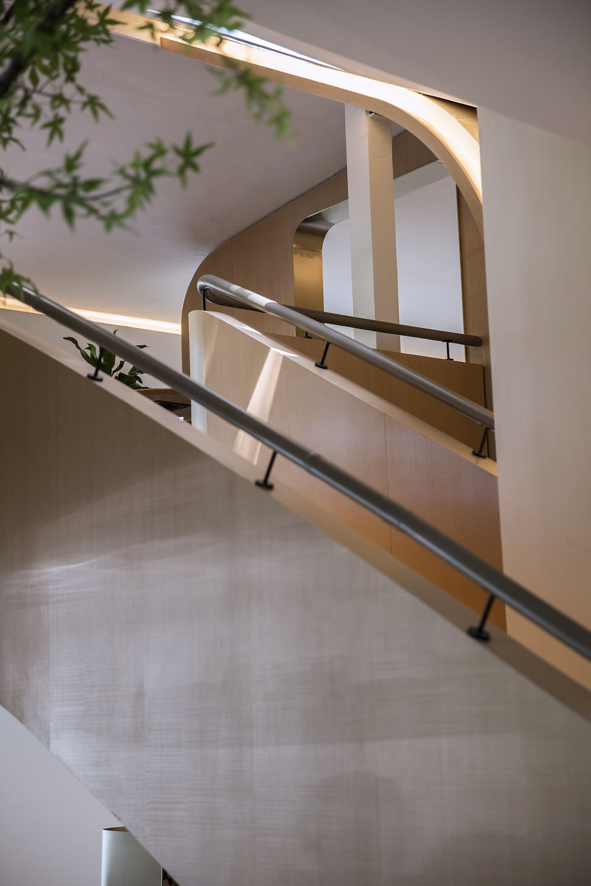 WJ Design combines dark facade with arched glass windows for pastry store in Hangzhou