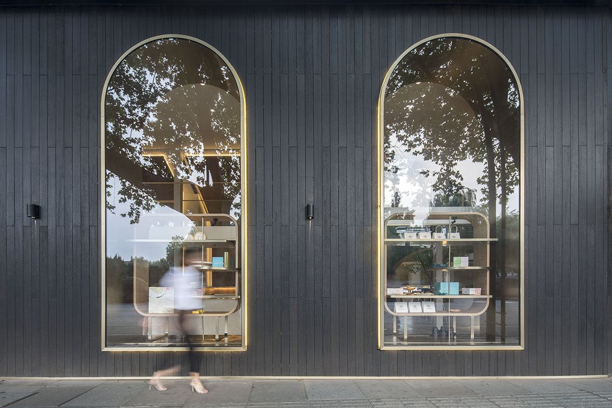 WJ Design combines dark facade with arched glass windows for pastry store in Hangzhou