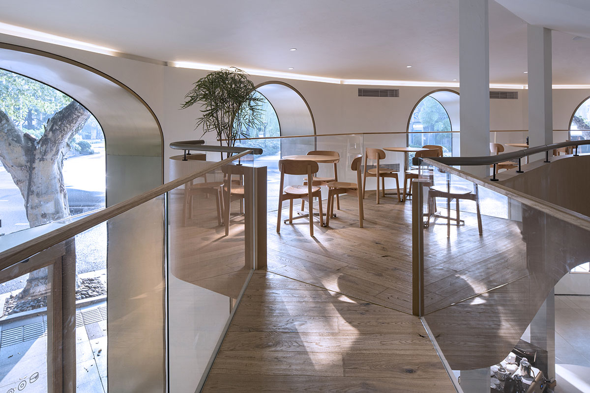 WJ Design combines dark facade with arched glass windows for pastry store in Hangzhou