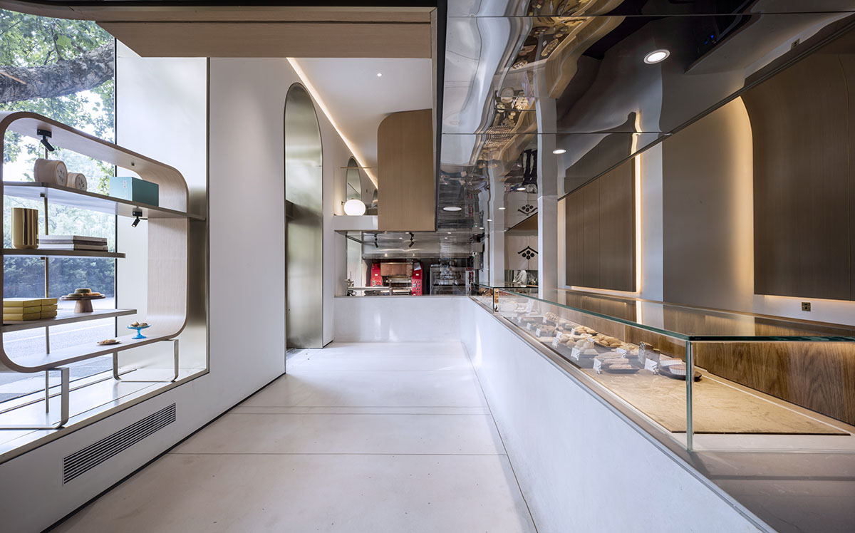 WJ Design combines dark facade with arched glass windows for pastry store in Hangzhou