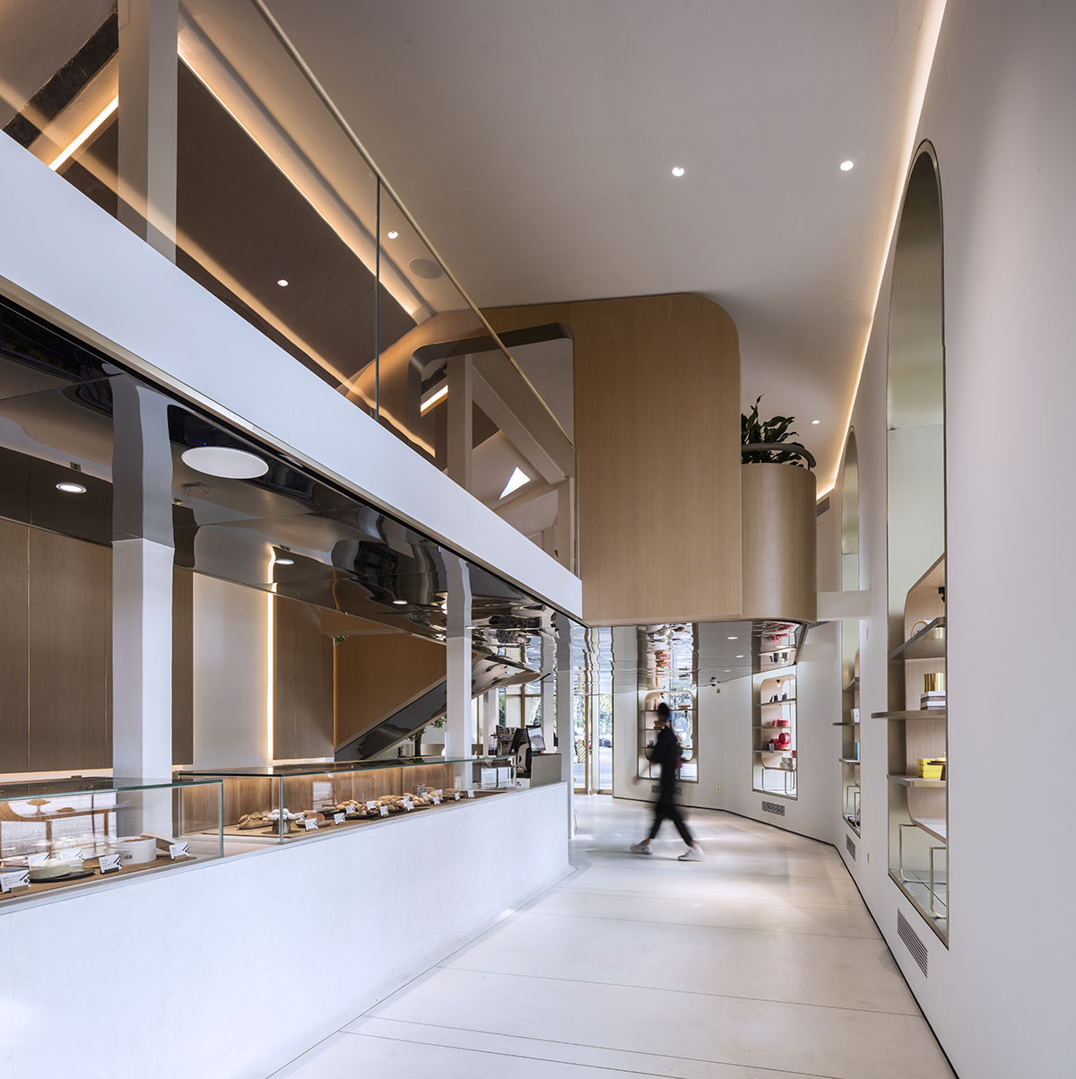 WJ Design combines dark facade with arched glass windows for pastry store in Hangzhou