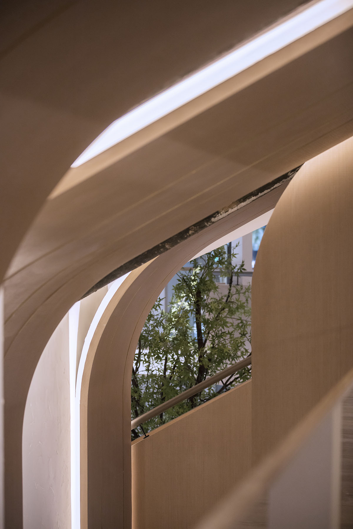 WJ Design combines dark facade with arched glass windows for pastry store in Hangzhou